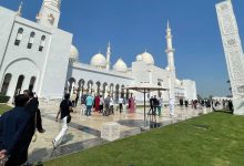 Do I need to buy and wear Emirati Thawb when visiting mosques in Dubai